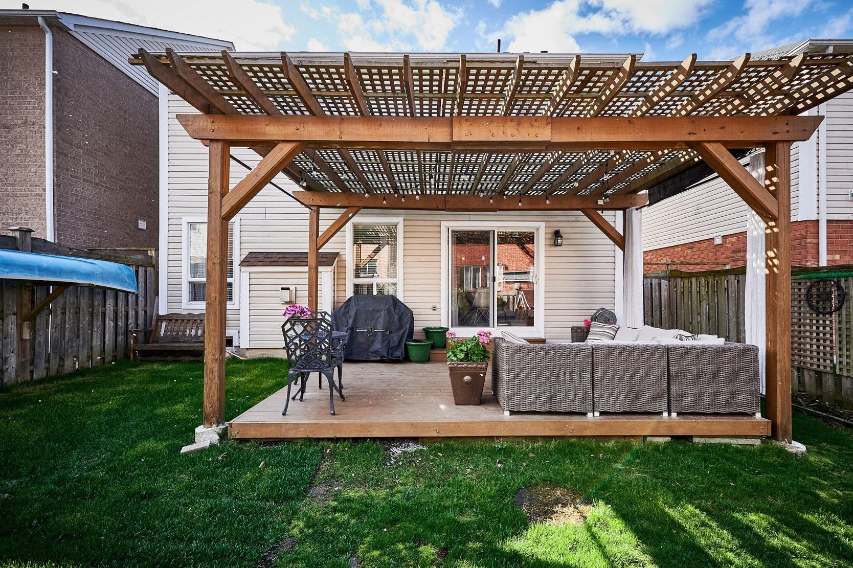 Back deck area and lawn at an Ajax, Ontario home for sale